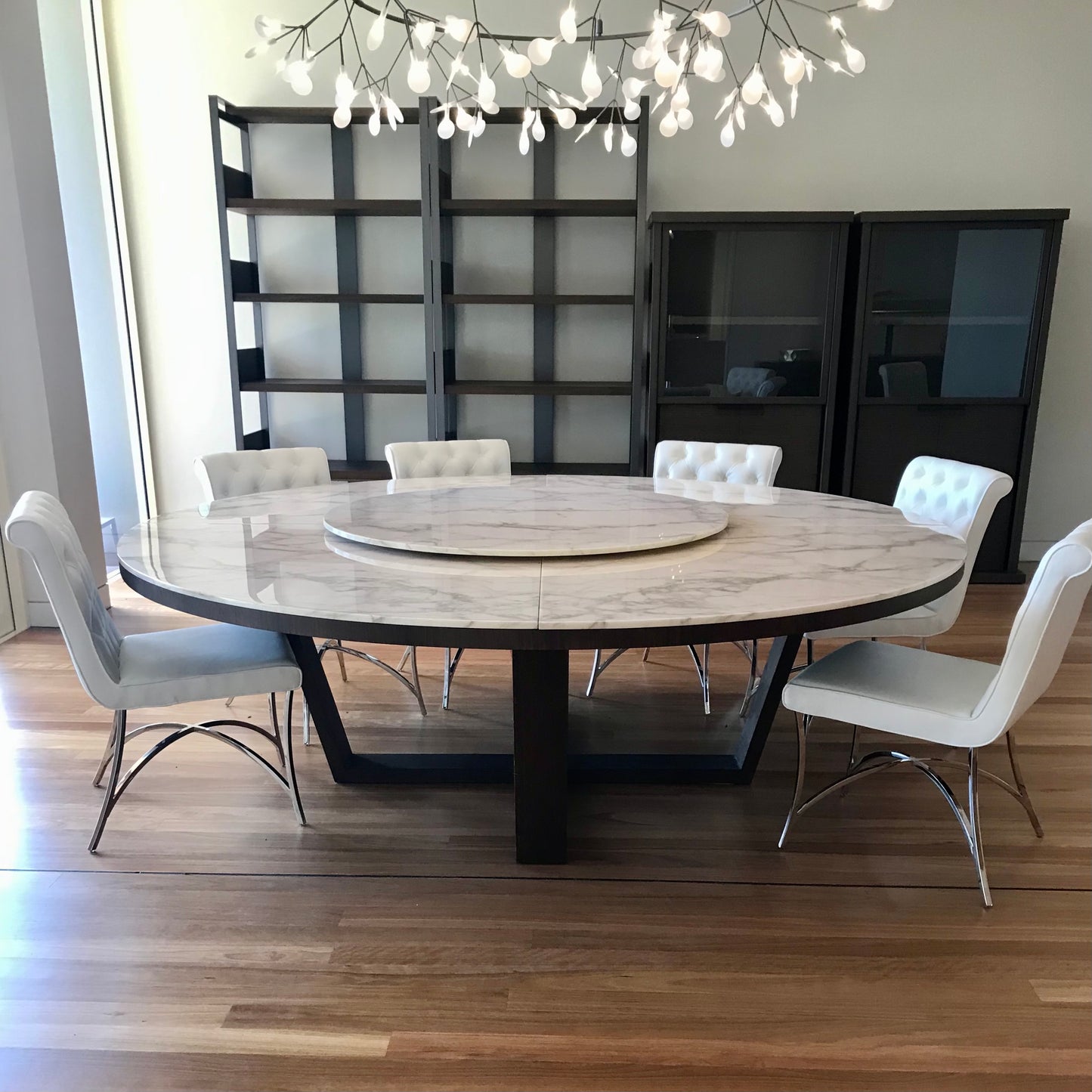 B&B Italia Xilos round dining table with marble top and swivel tray, pre-owned designer furniture