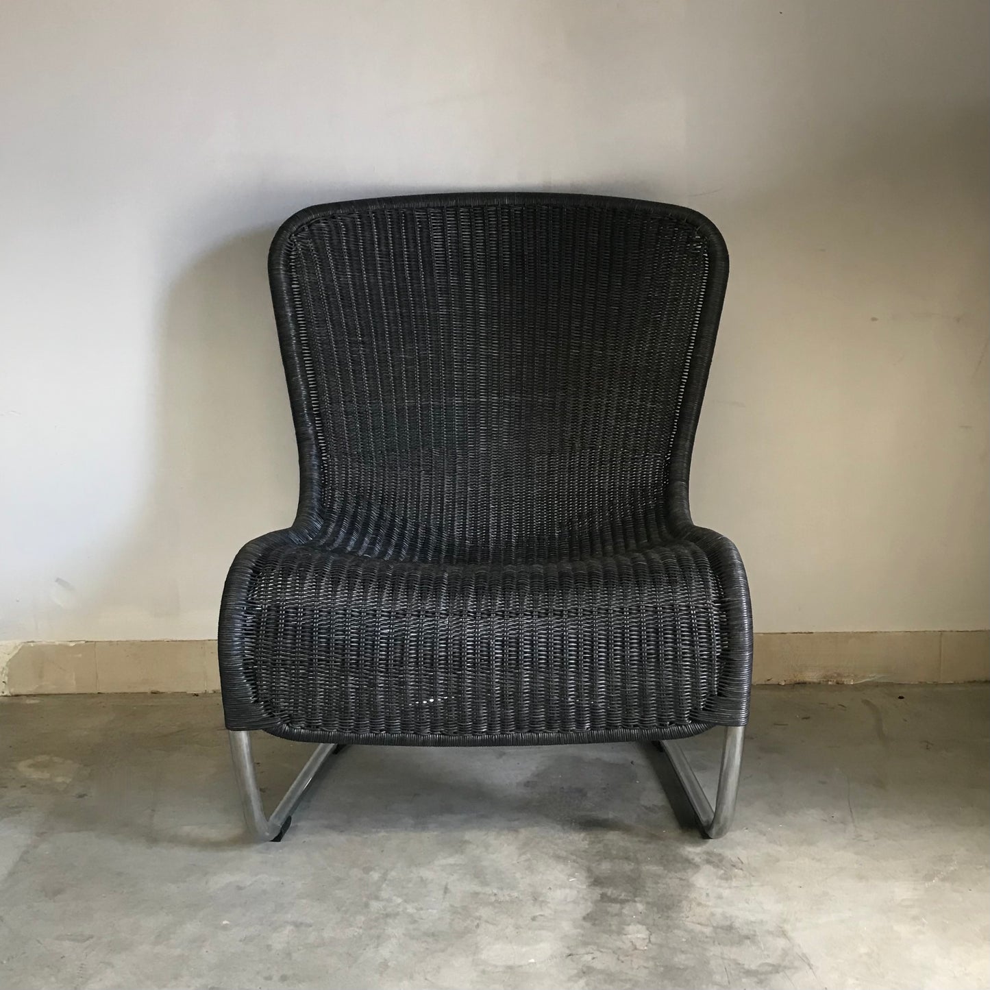 Feelgood Designs CL180 cantilever chair with chrome frame and charcoal rattan, pre-owned designer furniture