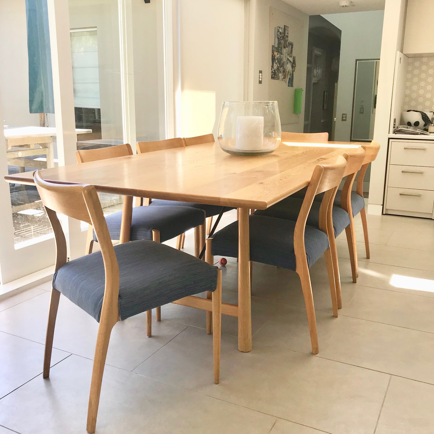 Jardan Japhy dining table in solid American oak with iron trestle base, pre-owned designer furniture