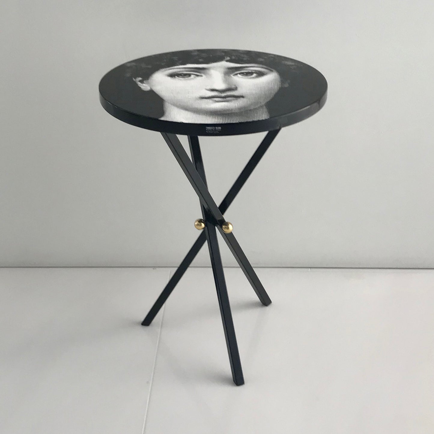 Fornasetti No. 6 accent table with Lina Cavalieri portrait on tripod base, pre-owned designer furniture