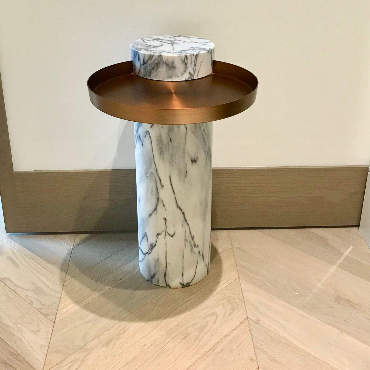 La Chance Salute side table with white marble column and copper tray, pre-owned designer furniture