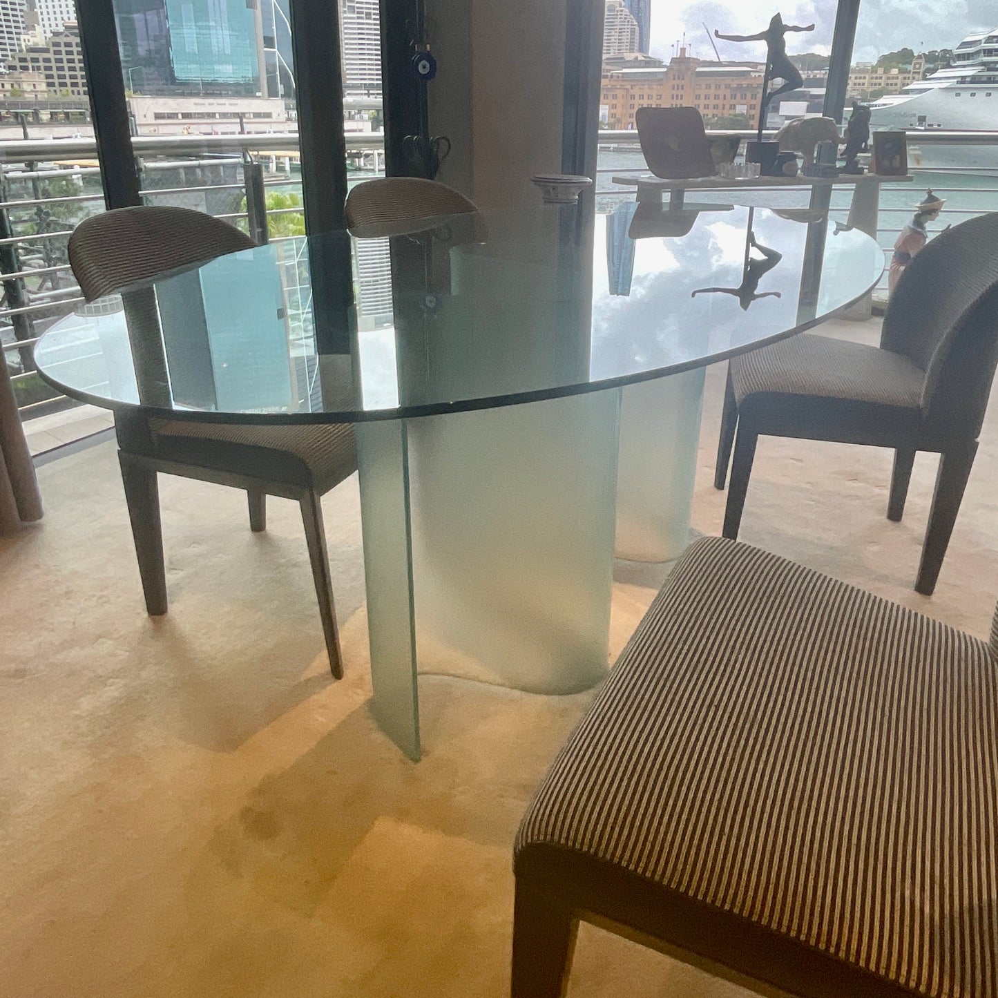 Fiam Italia Marea glass dining table with curved wave base, pre-owned designer furniture