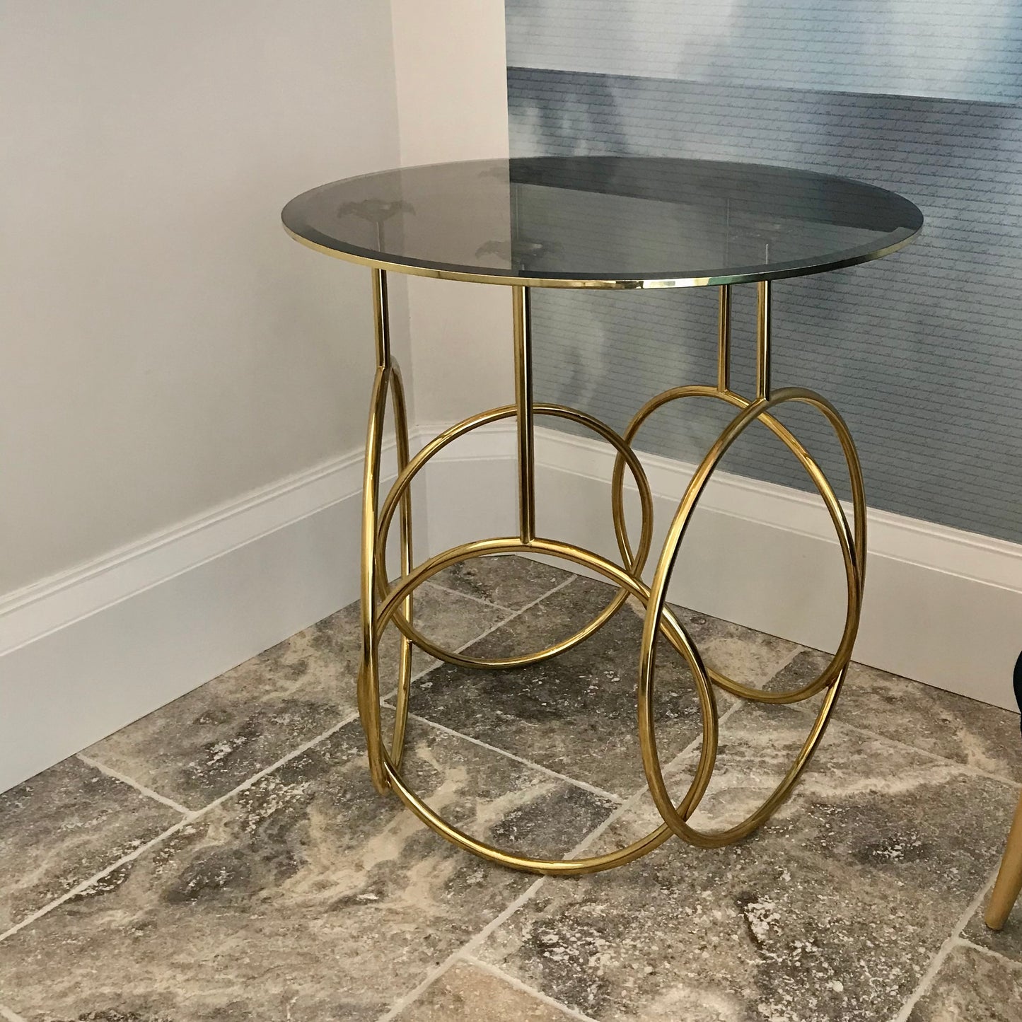 Koket Kiki side table with polished metal hoops and floral details, pre-owned designer furniture