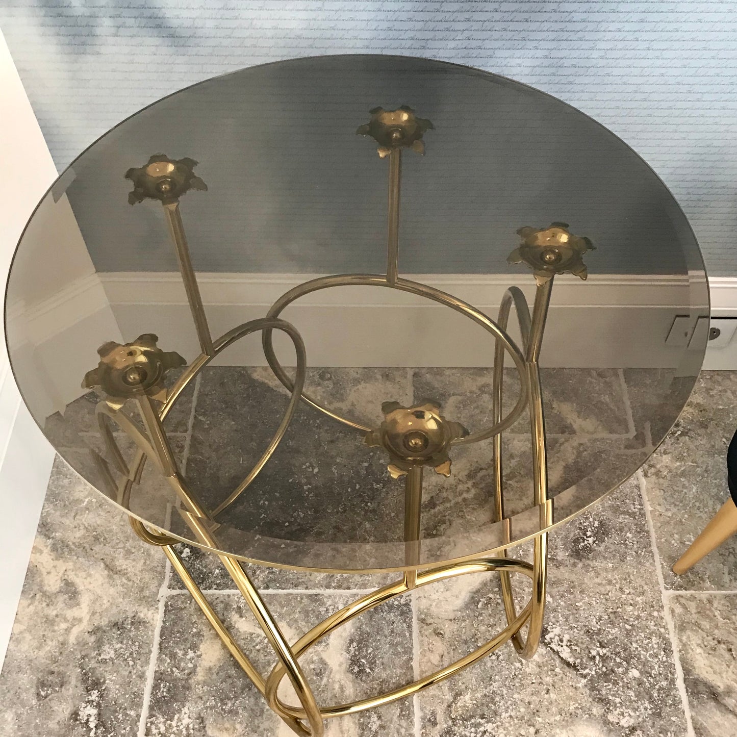 Koket Kiki side table with polished metal hoops and floral details, pre-owned designer furniture